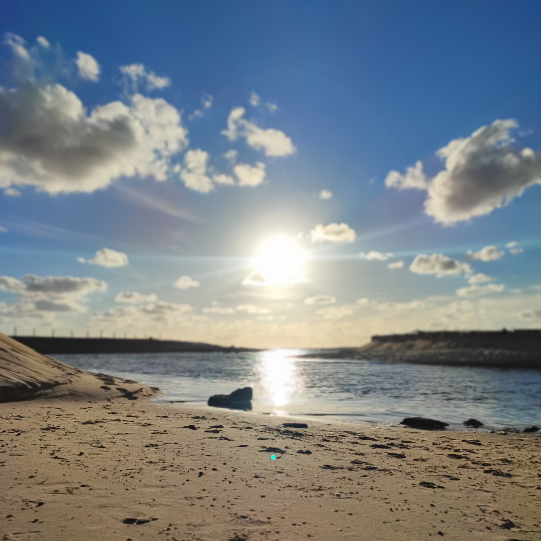 Photo de plage avec soleil